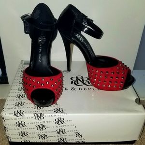 Red and black heels with silver studs on the top